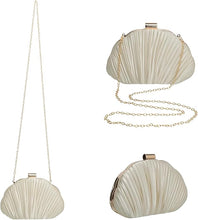 Set of three shell-shaped handbags with chain straps on a white background