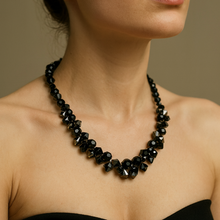 black statement necklace on a model 