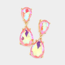 Pair of teardrop-shaped earrings with iridescent pink and gold accents on a white background
