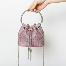 LIDIA evening pouch purse in pink showing drawstring chain and cascading tassels