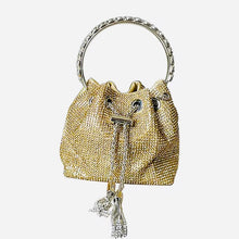 LIDIA gold pouch purse with detachable shoulder strap and gathered silhouette