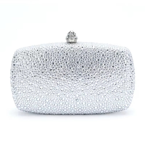 Silver clutch bag with crystal embellishments on a white background