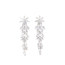 Pair of silver earrings with clear stones on a white background
