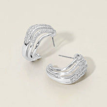 CYRENE Sculpted Pave Wave Huggie Earrings