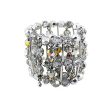 Elegant bracelet with crystal-like stones on a light gray background