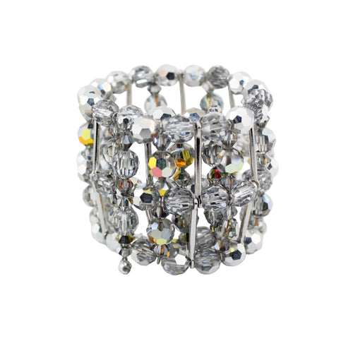 Elegant bracelet with crystal-like stones on a light gray background