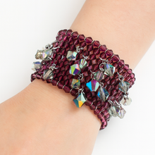 purple beaded bracelet on wrist 