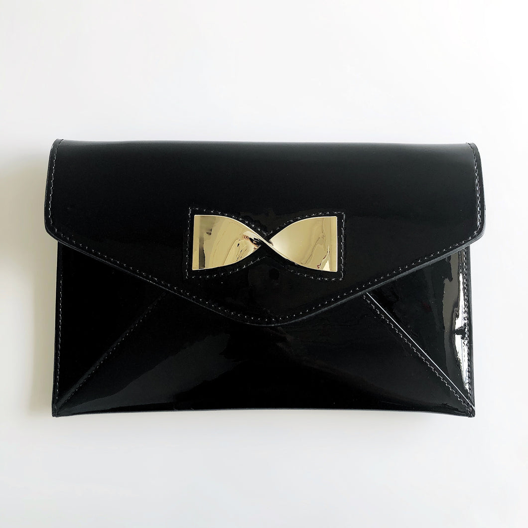 BLACK KNIGHT Faux Patent Leather Clutch with Gold Metal Bow Detail